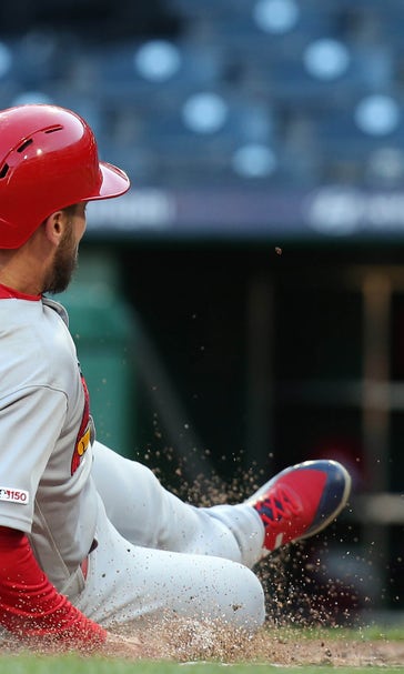 Cardinals rally three times to hand Pirates an 11th-inning, home-opening loss